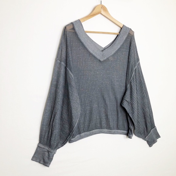 Free people with a free, gray, sheer oversized top - Picture 6 of 12